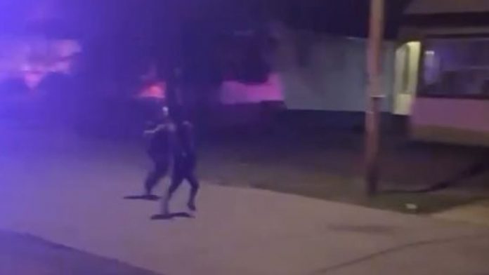 The suspect was filmed on social media being chased by a police officer